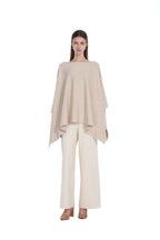 Boat Neck Asymmetrical Hem Draped Silhouette Knitted Cape Top